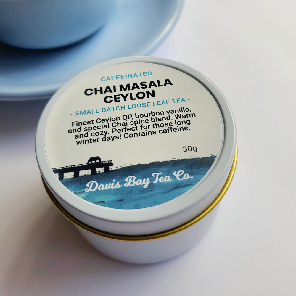 
                  
                    Tin of Chai Masala Ceylon tea with label on a light background
                  
                