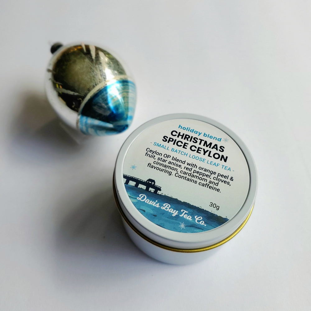 
                  
                    Tin of Christmas Spice Ceylon tea with a decorative lid on a light background
                  
                